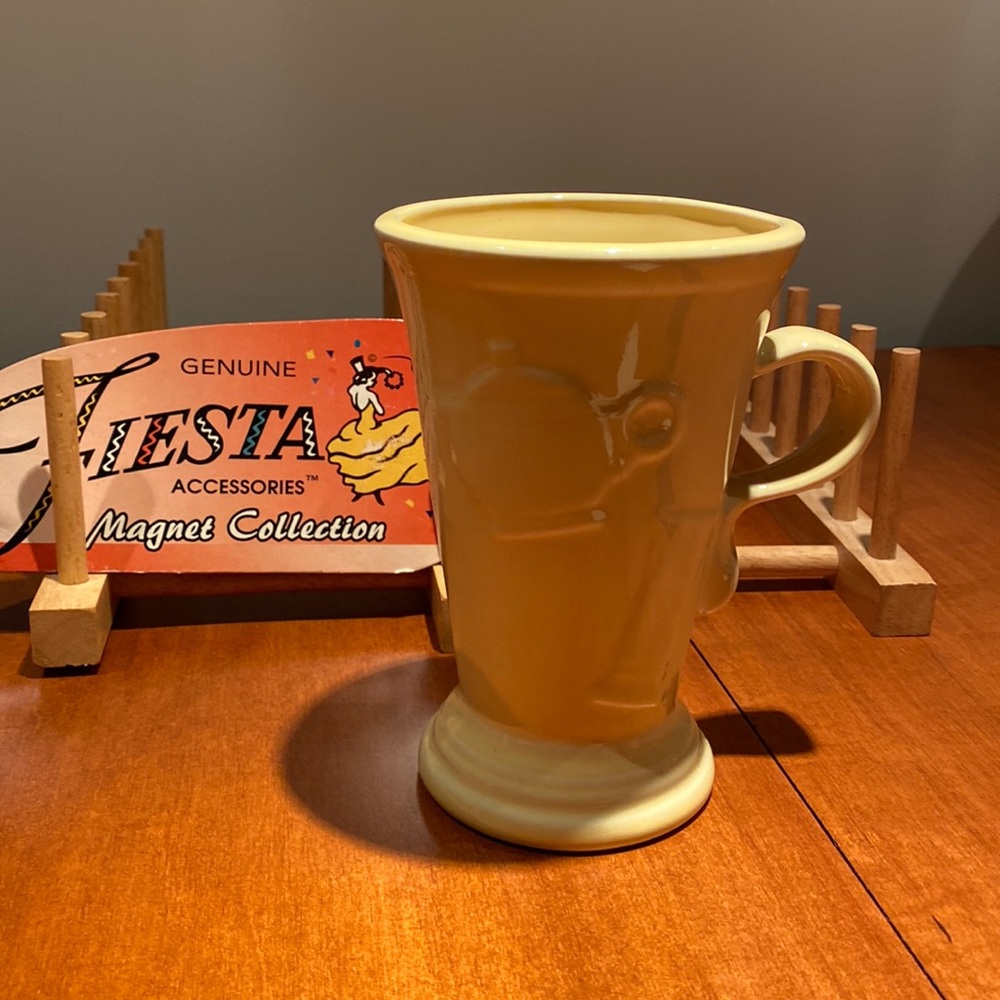 Fiestaware latte cup in yellow that was retired in 2002. Perfect condition